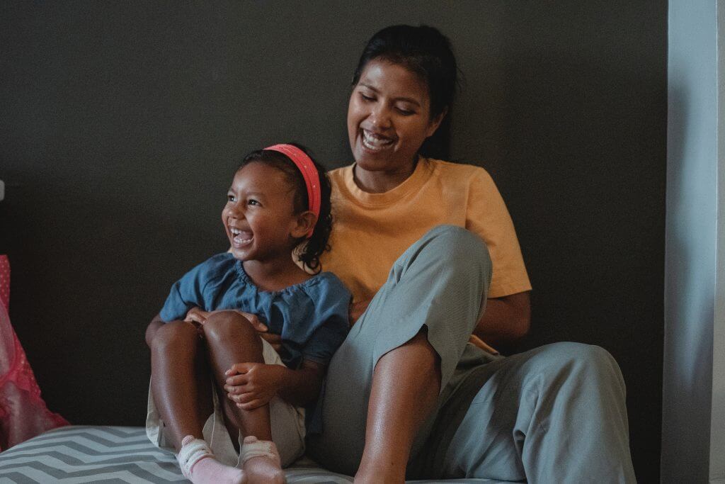 Ways to Connect With Your Kids - A mother and child share a laugh.