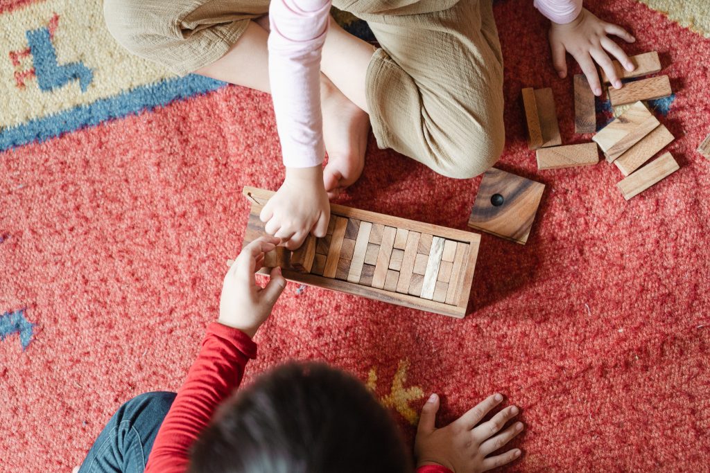 Helping Your Child Improve Gross Motor Skills - kids playing with blocks